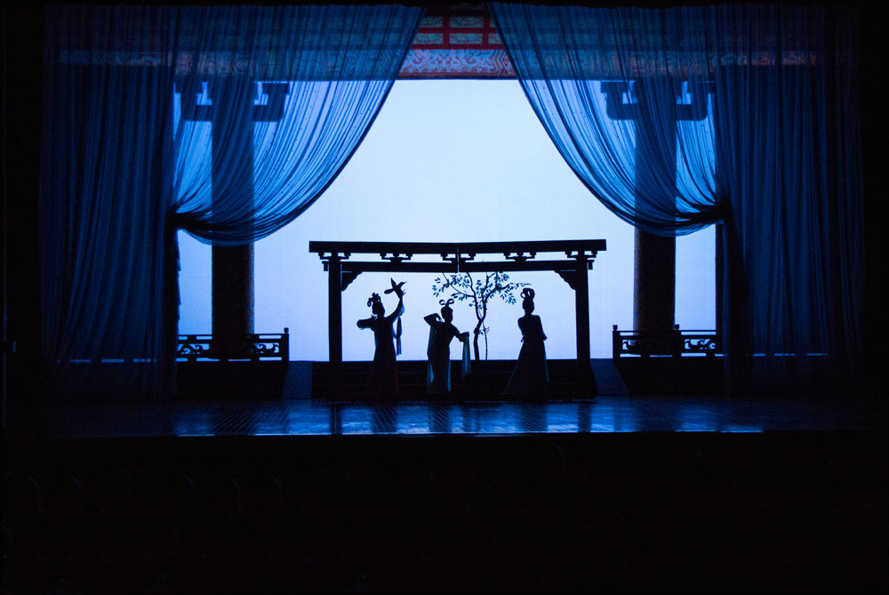 123 - Bluish scene, 3 ladies on stage. Xian.