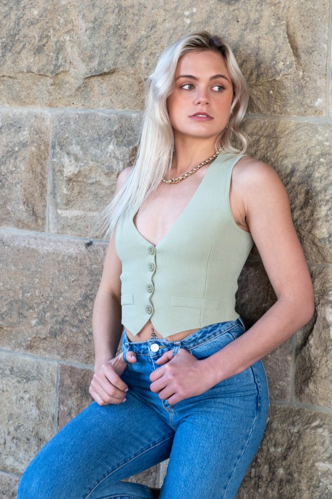 Model at Ash's photoshoot at Darling Harbour. Back to sandstone wall. Approx 2020